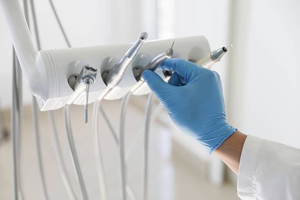 Professional Tooth Extraction technician working in Gibsonville, NC